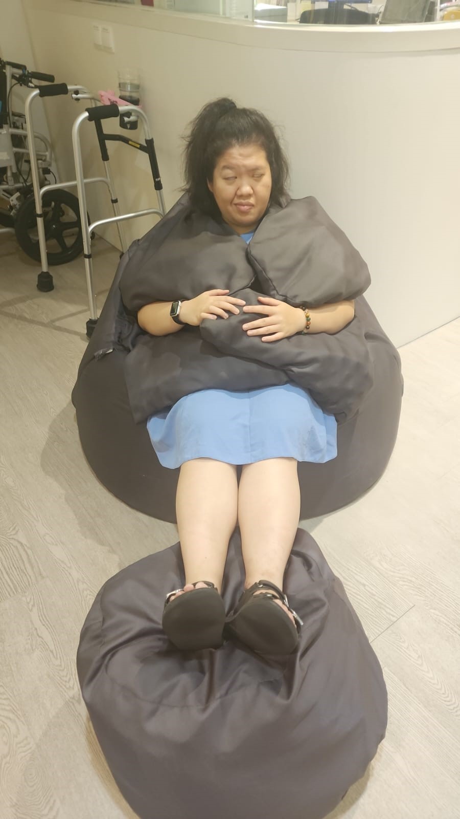 Siew Ling trying out the Protac SenSit Chair.